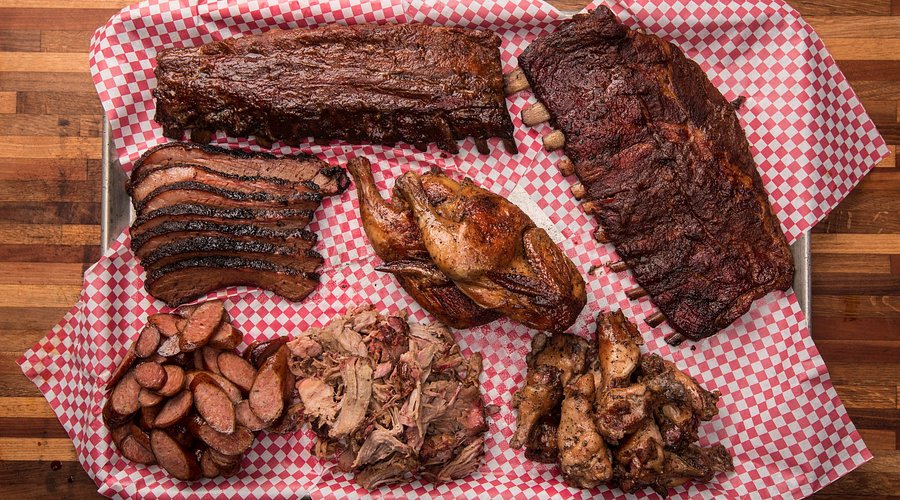 The Shed BBQ & Blues Joint signature dishes Baby Back RibsPulled Pork SandwichBeef Brisket